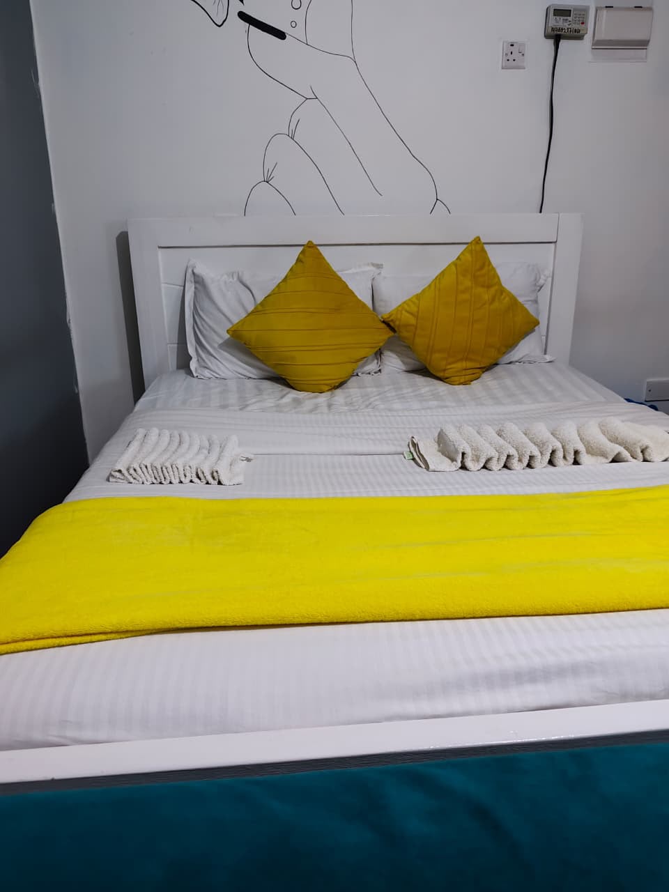 Queen bed with fresh linen in the Velora Ngong Road studio