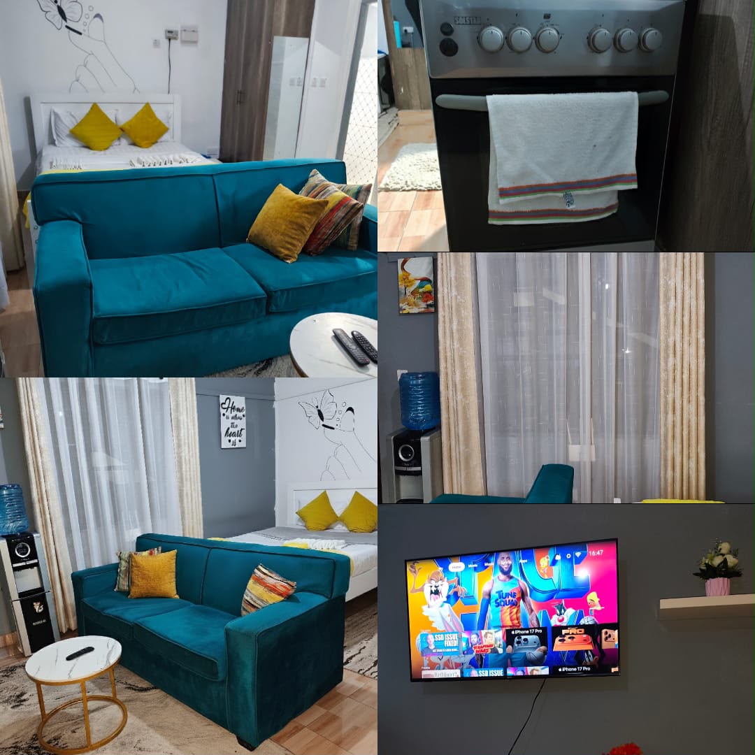 Teal green sofa, queen bed and smart TV in the Ongata Rongai studio
