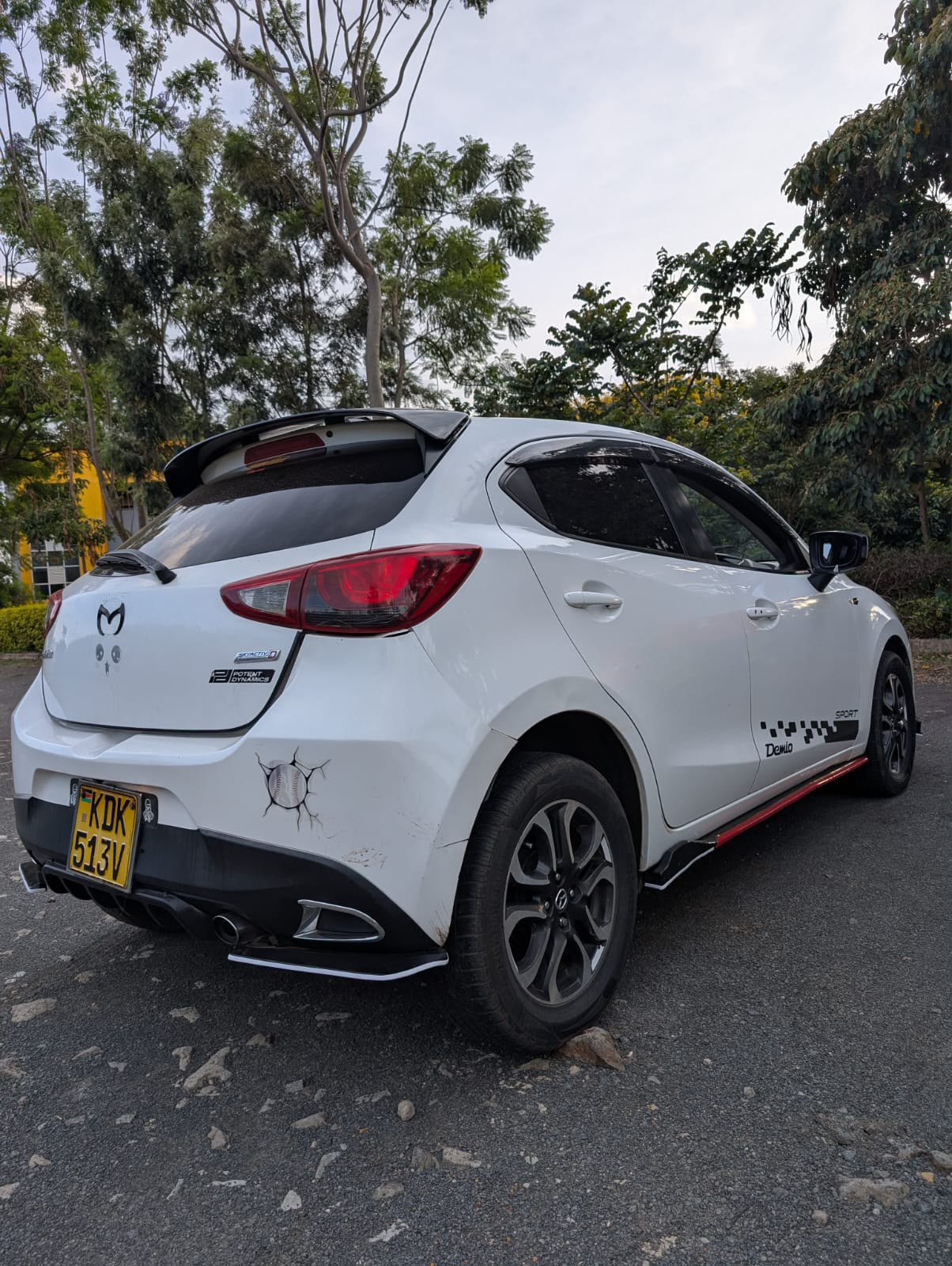 Mazda Demio (White, Diesel) — Rear view