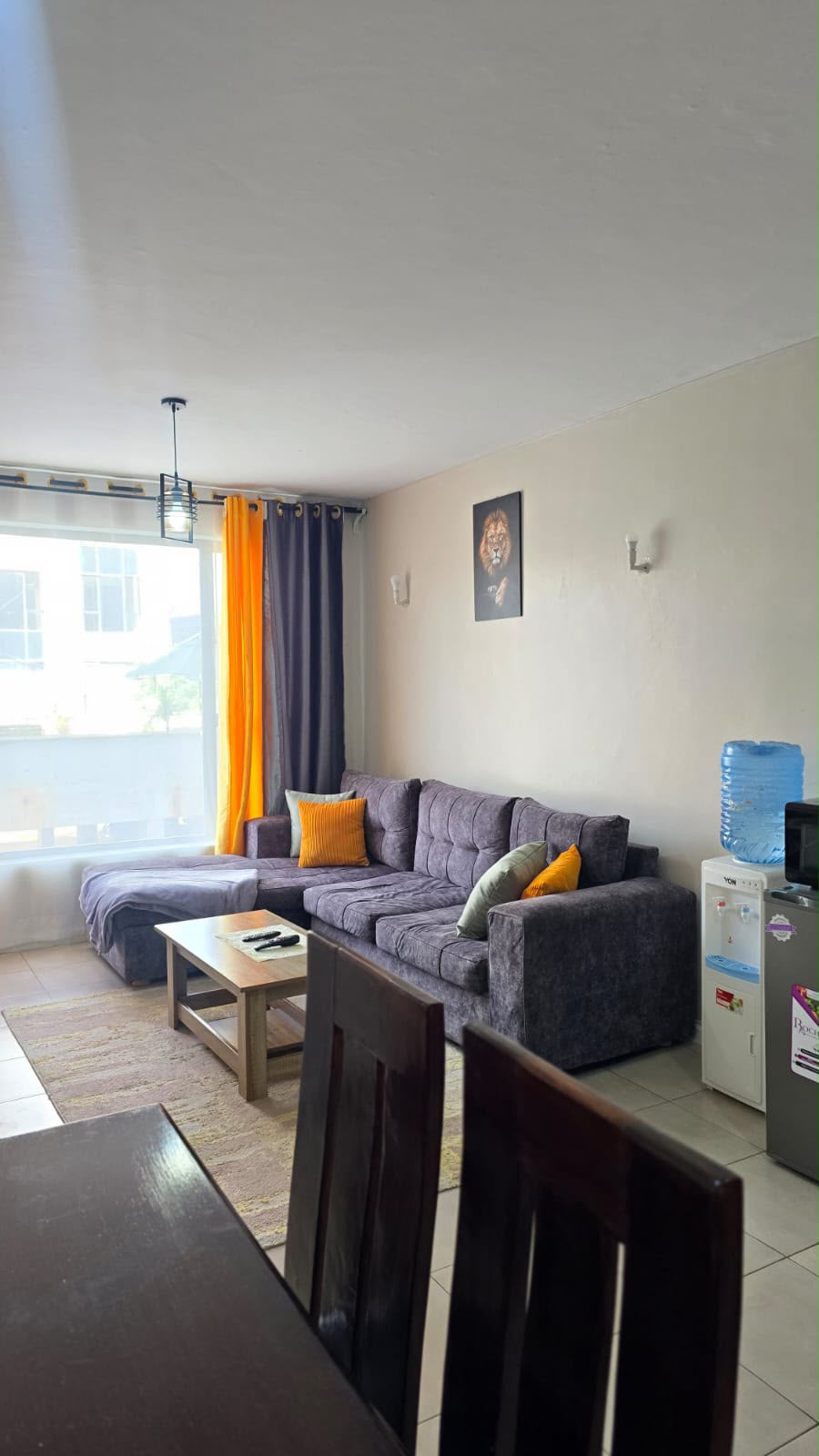 Four seater wooden dining set in the Tsavo Rongai two bedroom apartment